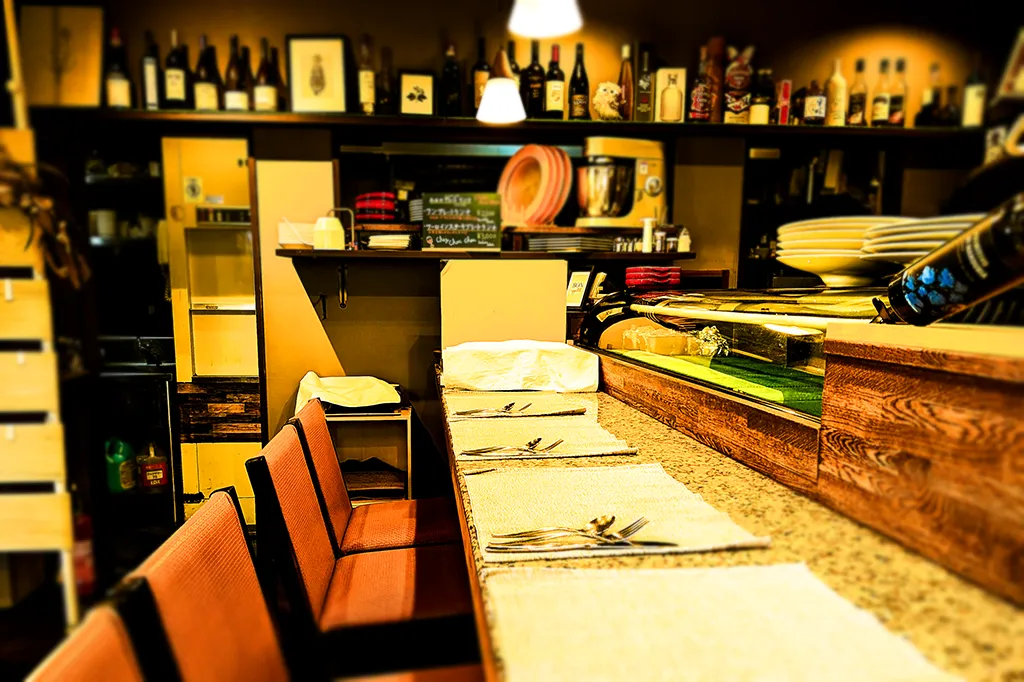 カウンター席でのシェフとの会話